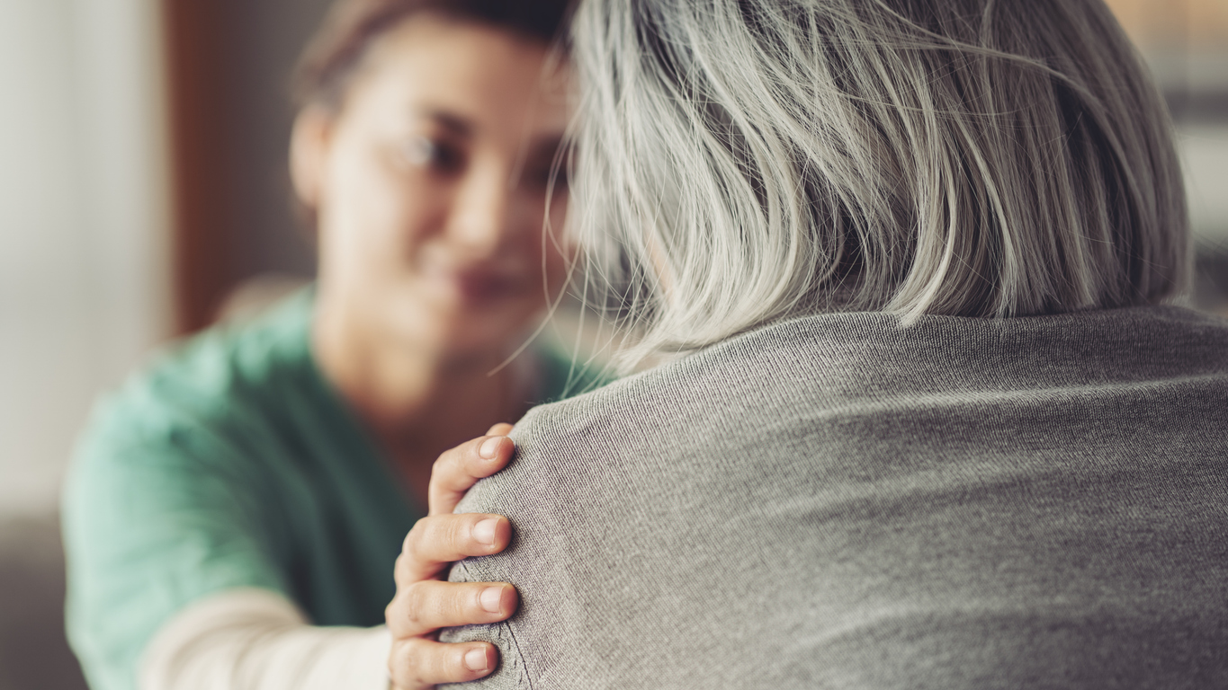 Therapist calms anxious patient