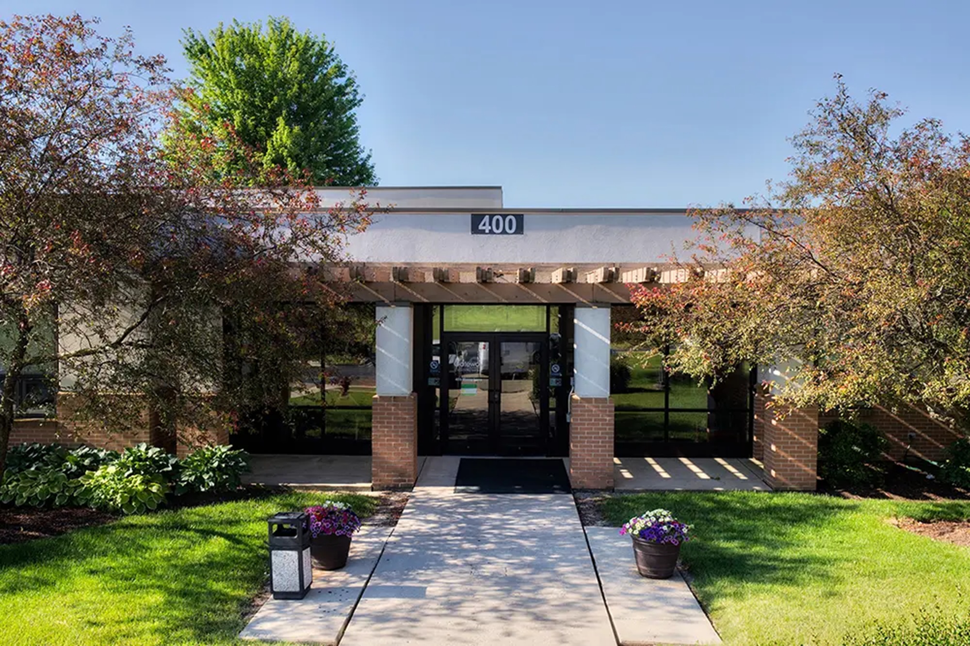Exterior shot of a treatment center surrounded by greenery