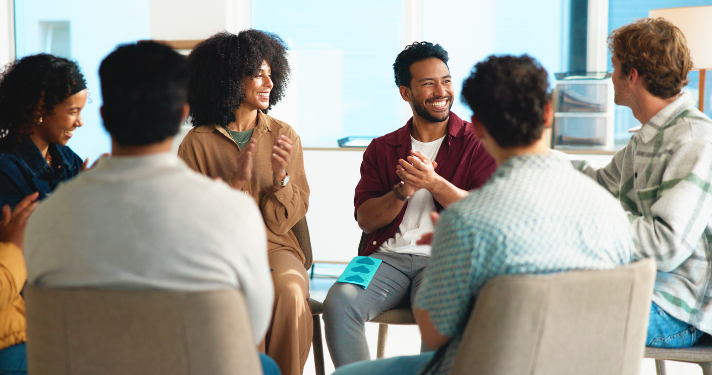 Happy people in support group